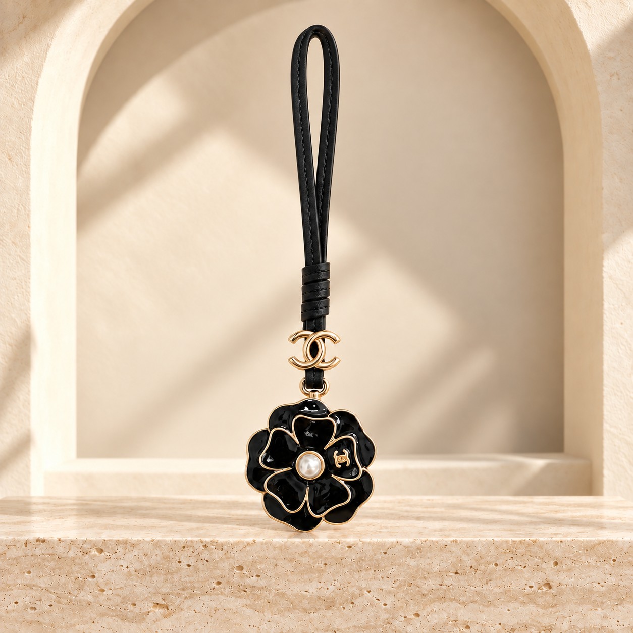 Camellia Bag Charm in its first photographed design, front view