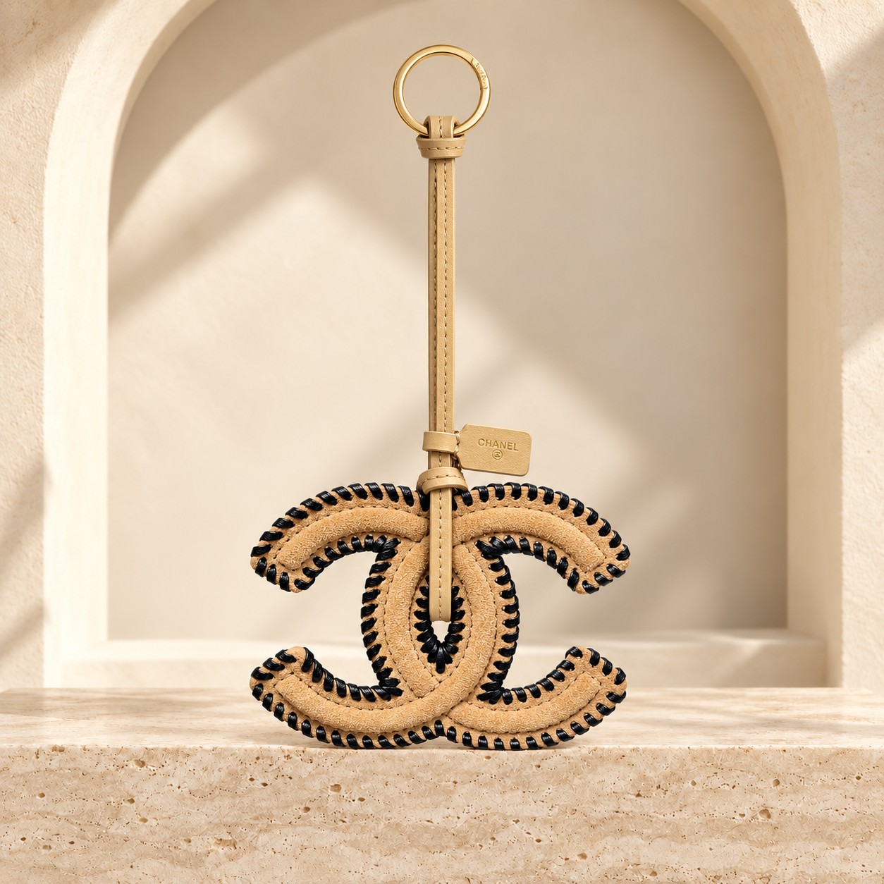 Stitched Double C Bag Charm in its first photographed design, front view
