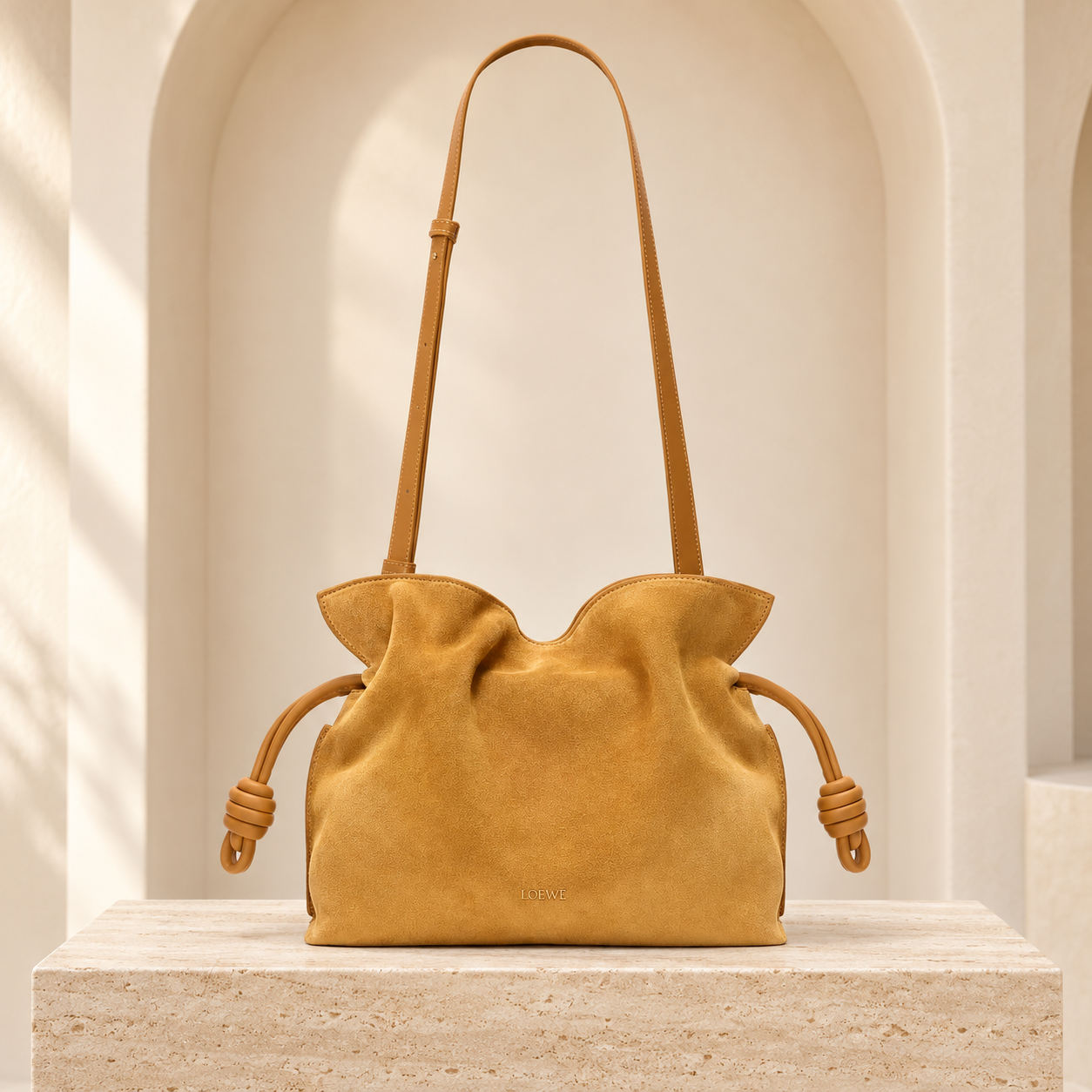 Loewe Flamenco Clutch Medium in warm tan suede, straight-on front view